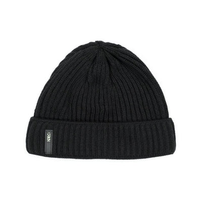 A black beanie. Fisherman style with a small DRKN rubber label. 